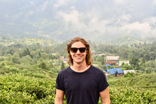 Man wearing BAMWOO bamboo's Jungle Sunglasses in dark Bamboo