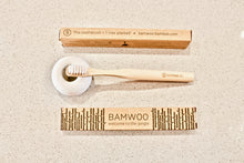 BAMWOO children's bamboo toothbrush in natural with white ceramic toothbrush holder