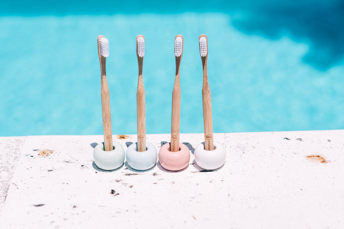 Four of BAMWOO's ceramic toothbrush holders
