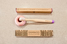 BAMWOO children's bamboo toothbrush in dawn purple with pink ceramic toothbrush holder